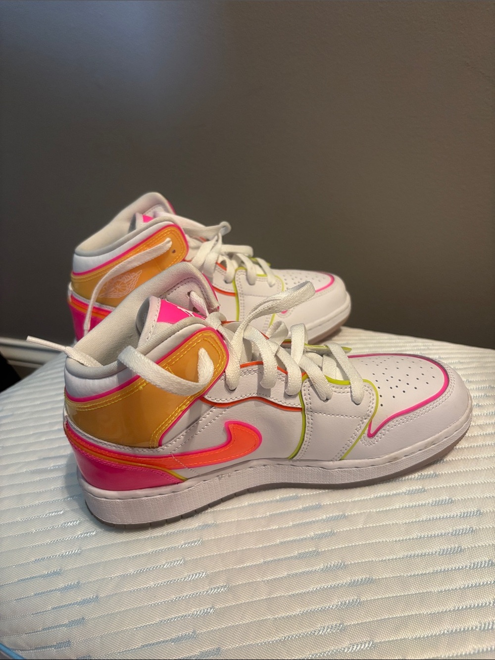 Nike White High-Top Sneakers with Pink and Yellow Accents